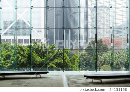 Modern glass wall of office building Modern glass wall of office building 24131168