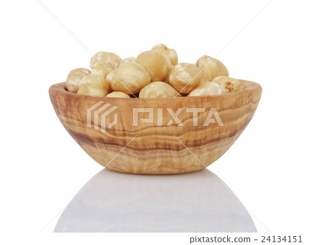 heap of peeled hazelnuts in bowl isolated heap of peeled hazelnuts in bowl isolated 24134151