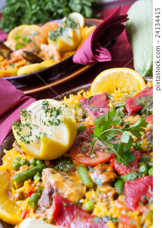 paella with shrimps and vegetables paella with shrimps and vegetables 24134415