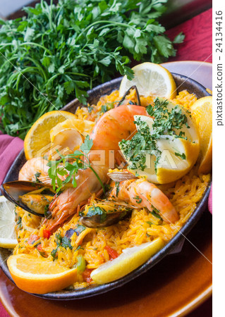paella with shrimps and vegetables 24134416