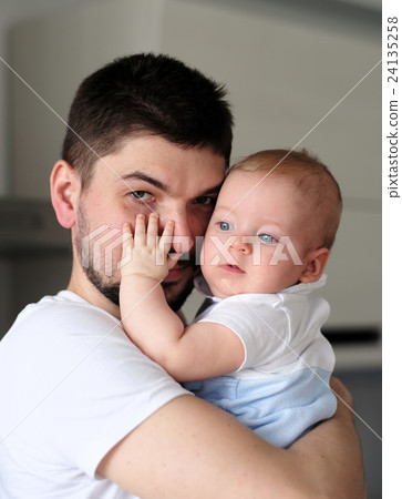 Newborn with his father Newborn with his father 24135258