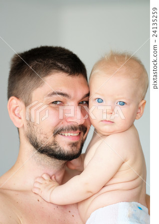 Baby boy with father 24135259