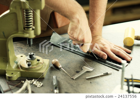 Leather workshop owner 24137556