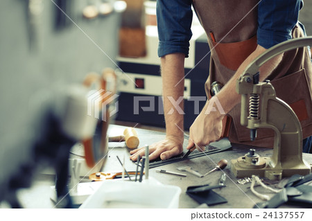 Leather workshop owner 24137557