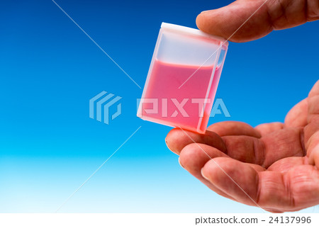 Red Sample of drug medicament in kuvette 24137996
