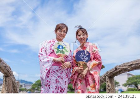 A woman in a yukata A woman in a yukata 24139123