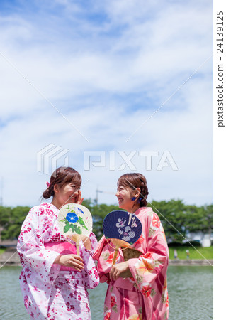 A woman in a yukata A woman in a yukata 24139125
