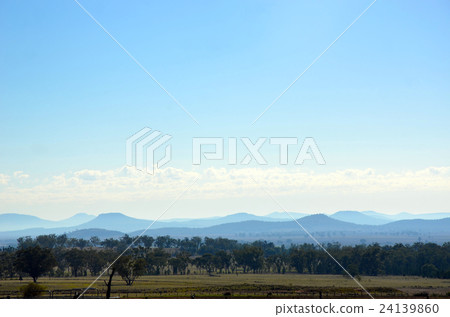 Countryside, forest and misty mountains 24139860
