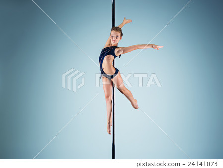 The strong and graceful young girl performing The strong and graceful young girl performing 24141073