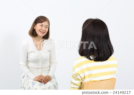 Senior middle-aged woman talking Senior middle-aged woman talking 24149217