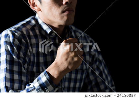 Male holding a fist black back 24150887