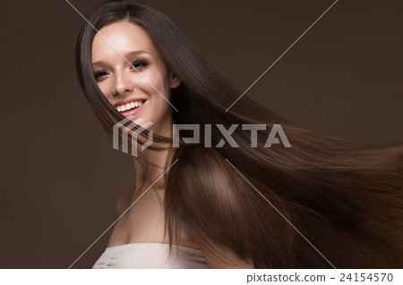 Beautiful brunette girl in move with a perfectly 24154570