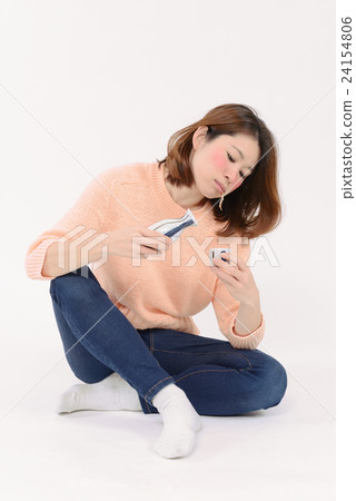 A young woman drunk with drinking sake A young woman drunk with drinking sake 24154806