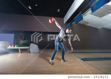 Man playing bowling Man playing bowling 24156215