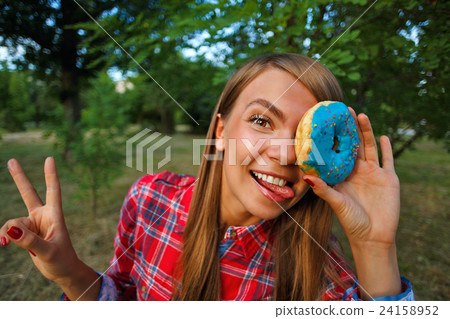 Merry girl and a donut Merry girl and a donut 24158952