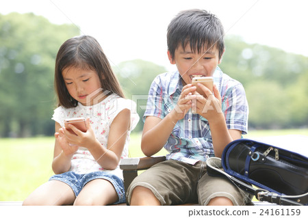 Child with smartphone Child with smartphone 24161159