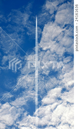 Contrail through clouds Contrail through clouds 24161636