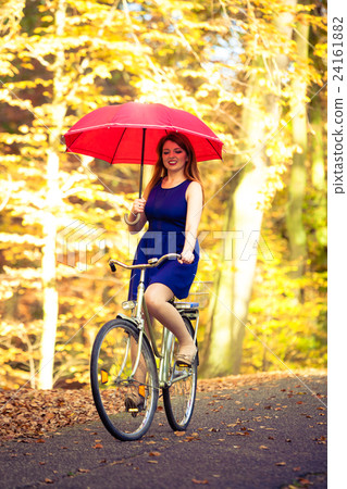Elegant girl cycling. 24161882