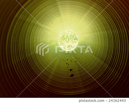 View inside of long plastic tube under ground. View inside of long plastic tube under ground. 24162443