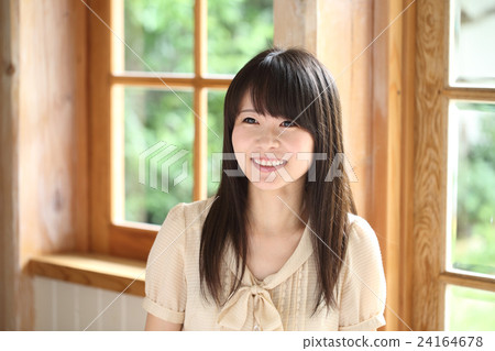 Smiling woman in her twenties Smiling woman in her twenties 24164678