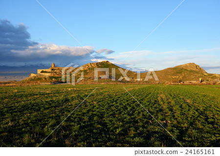 Ancient monastery in front of mountain 24165161