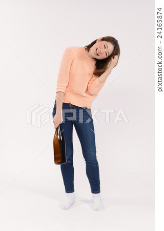 A drunken young lady with a bottle A drunken young lady with a bottle 24165874