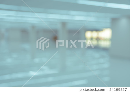 Blurry empty modern office building interior Blurry empty modern office building interior 24169857