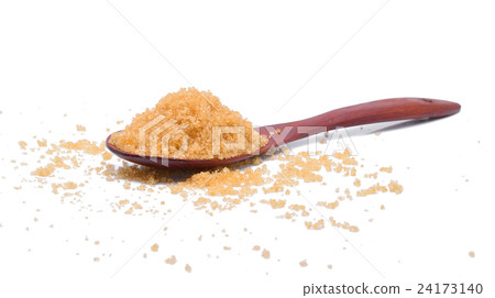 brown sugar in a wooden spoon isolated on white 24173140