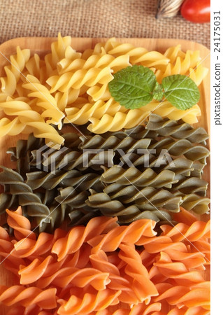 Raw homemade italian pasta colorful for cooking. Raw homemade italian pasta colorful for cooking. 24175031