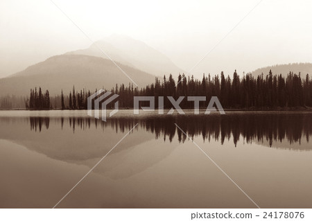 Foggy mountain lake 24178076