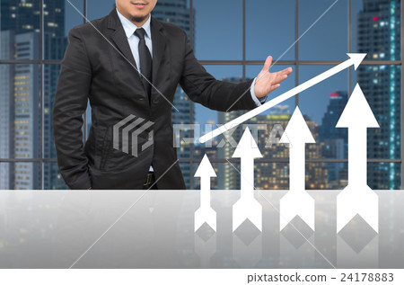 Businessman with growth up arrow in office conference meeting room on photo blurred cityscape, Business investment growth concept 24178883