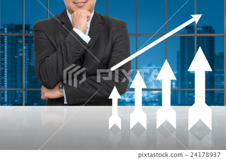Businessman with growth up arrow in office conference meeting room on photo blurred cityscape, Business investment growth concept Businessman with growth up arrow in office conference meeting room on photo blurred cityscape, Business investment growth concept 24178937