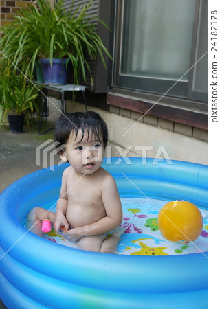 Water play in the plastic pool Water play in the plastic pool 24182178