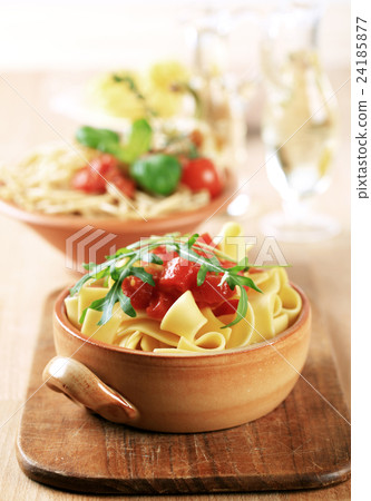 Ribbon pasta and diced tomato  24185877