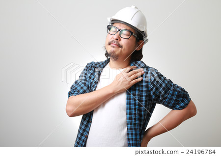 The Asian engineer hurt his back. The Asian engineer hurt his back. 24196784