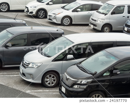 Passenger cars lining up in the parking lot Passenger cars lining up in the parking lot 24197770