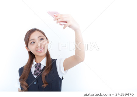 Young receptionist who takes self-portrait Young receptionist who takes self-portrait 24199470