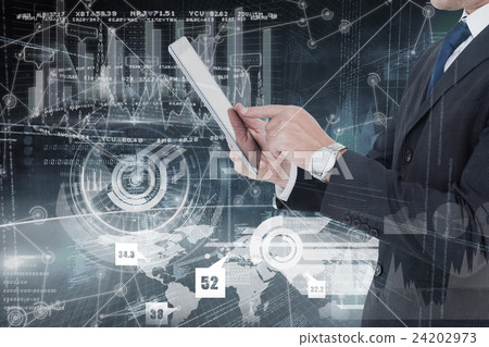 Composite image of businessman in suit using digital tablet Composite image of businessman in suit using digital tablet 24202973