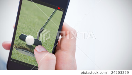 Composite image of woman using her mobile phone Composite image of woman using her mobile phone 24203239