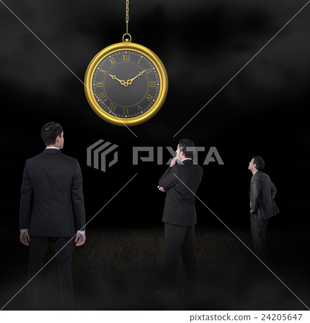 Serious businessman looking hour with hands on hips Serious businessman looking hour with hands on hips 24205647