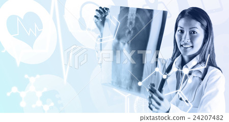 Composite image of asian doctor checking mri scan 24207482