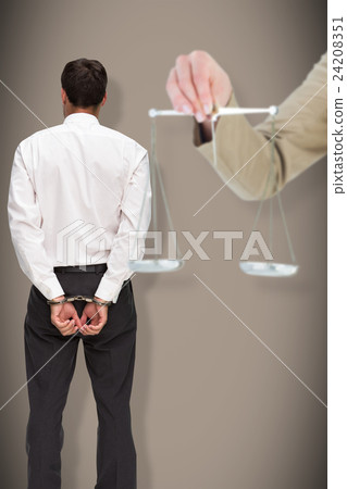 Composite image of young woman holding scales of justice and a gavel Composite image of young woman holding scales of justice and a gavel 24208351