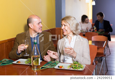 man and woman in restaurant man and woman in restaurant 24209051