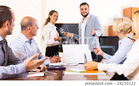 Positive brainstorming in office 24210122