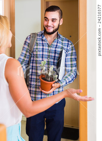 girl and her boyfriend with luggage moving together girl and her boyfriend with luggage moving together 24210377