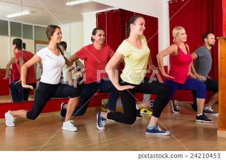 Smiling people exercising choreography 24210453