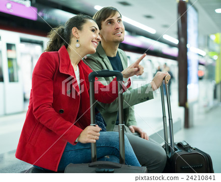 couple sitting at platform couple sitting at platform 24210841