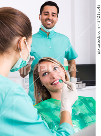 Happy patient at dental clinic Happy patient at dental clinic 24212142