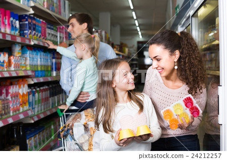 Family purchasing yoghurts in supermarket. Family purchasing yoghurts in supermarket. 24212257