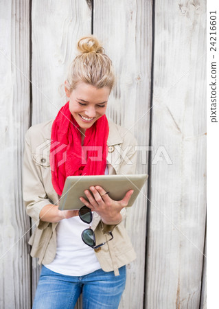 Young woman using digital tablet 24216601
